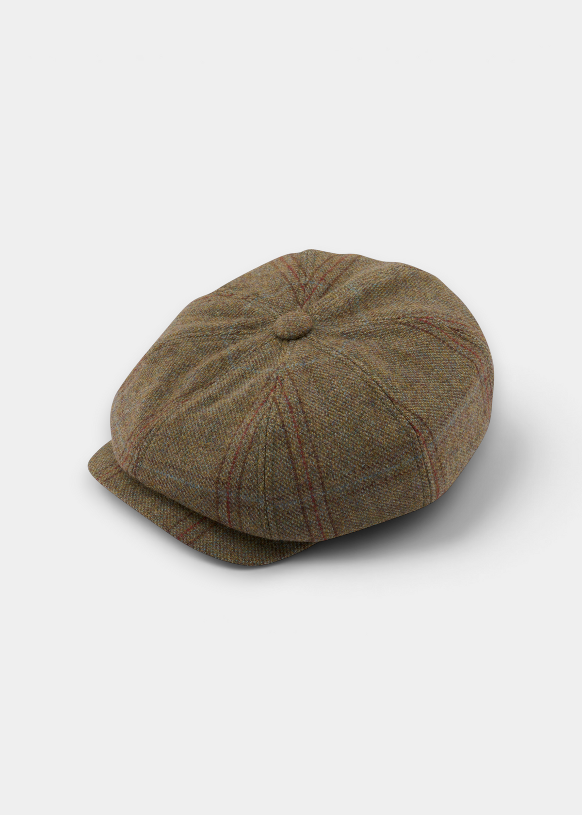 Alan Paine Combrook ladies tweed country cap in laurel green wool with a subtle red and blue check pattern.