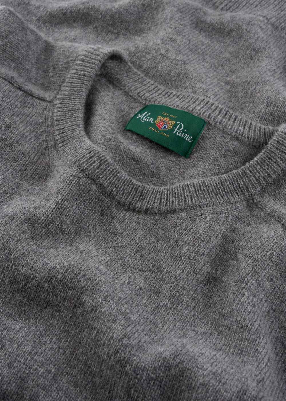 Dorset Lambswool Crew Neck Jumper in Grey Mix, Classic Fit, with green Alan Paine label at inner collar.