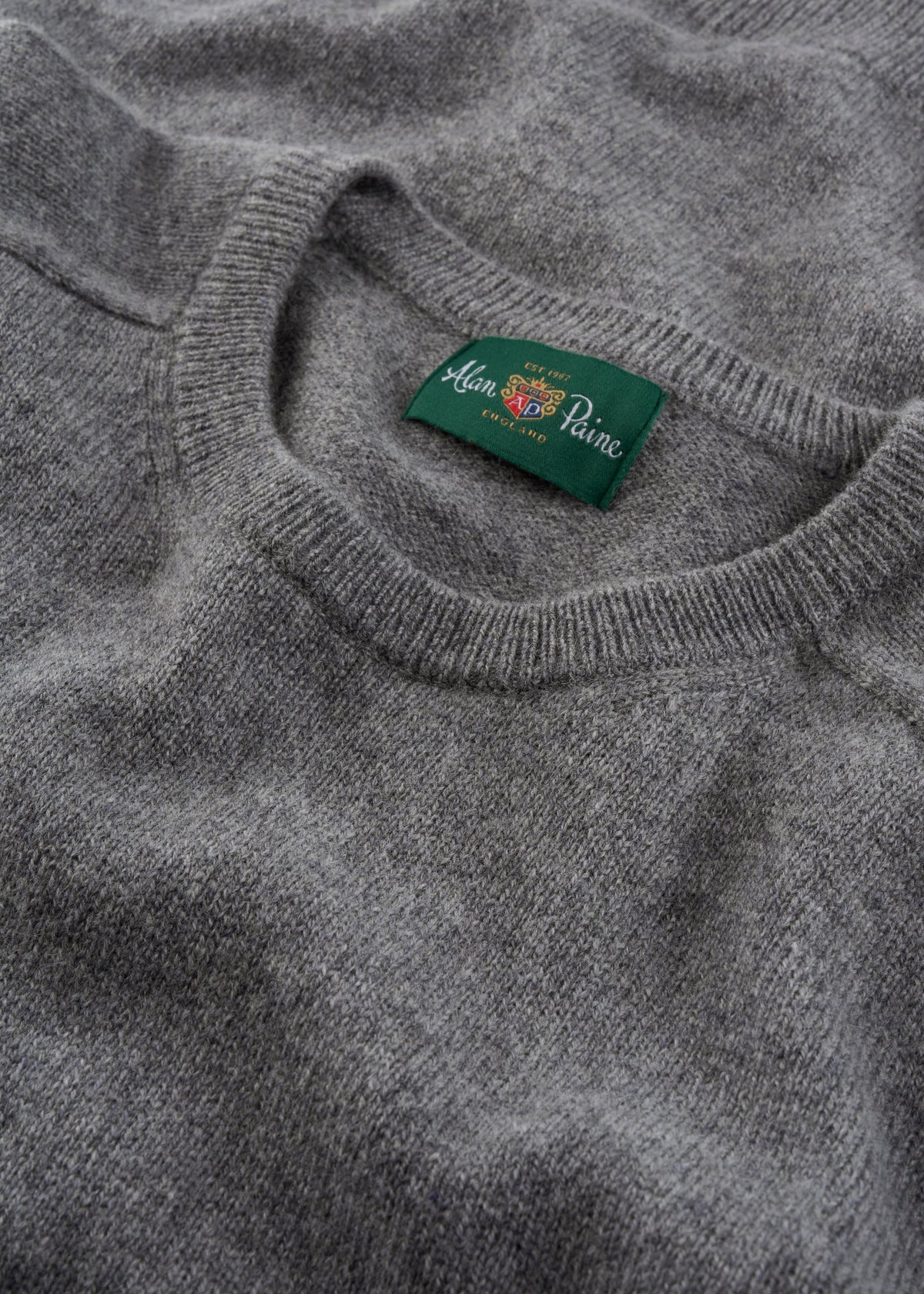 Dorset Lambswool Crew Neck Jumper in Grey Mix, Classic Fit, with green Alan Paine label at inner collar.