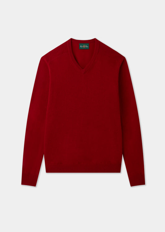 Hampshire Lambswool Vee Neck Jumper in Dubonnet, classic fit, red, long sleeves; laid flat on white background.