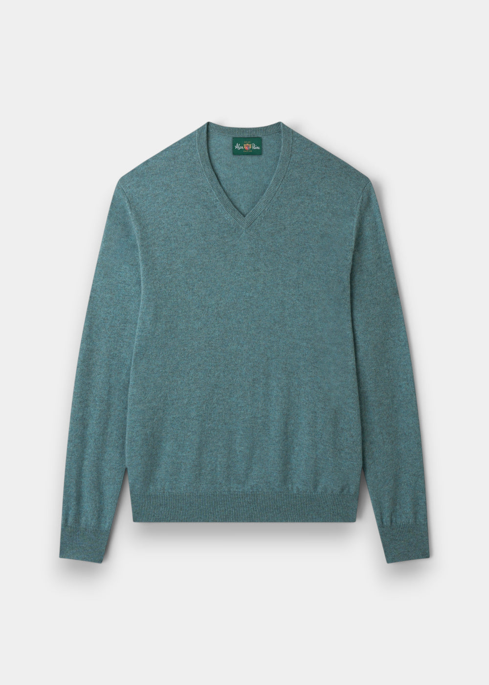 Haddington Pure Cashmere V-Neck Jumper in Caspian, regular fit, shown laid flat with ribbed cuffs on white.
