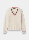 Alan Paine ladies ecru cable knit cricket jumper with v-neck, featuring dusk pink and dark navy striped trim.