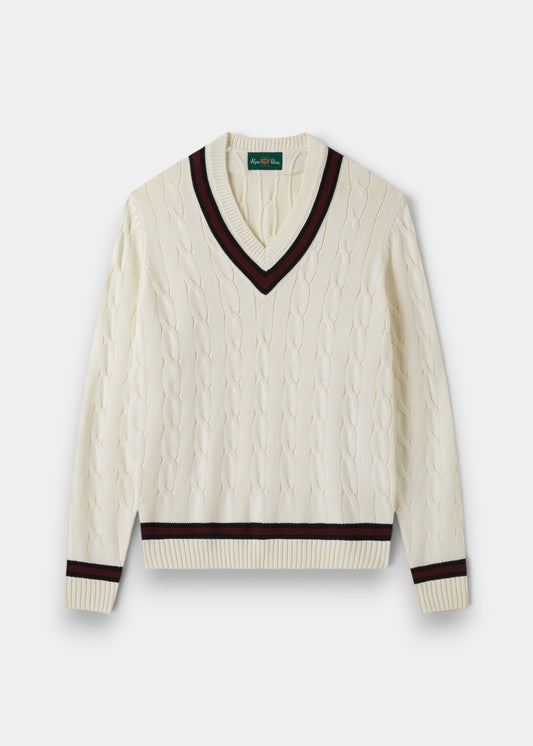 Alan Paine Sandridge ecru cotton cable knit cricket jumper with dark navy and burgundy V-neck and hem trim.
