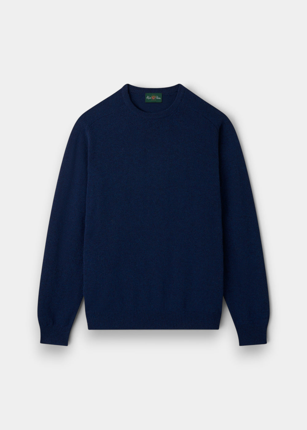 Dorset Lambswool Crew Neck Jumper in Indigo, Classic Fit, long sleeves, laid flat on a plain white background.