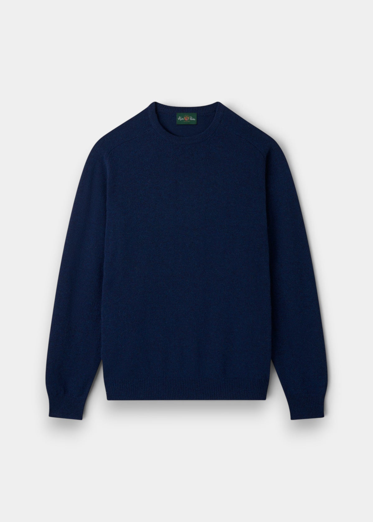 Dorset Lambswool Crew Neck Jumper in Indigo, Classic Fit, long sleeves, laid flat on a plain white background.
