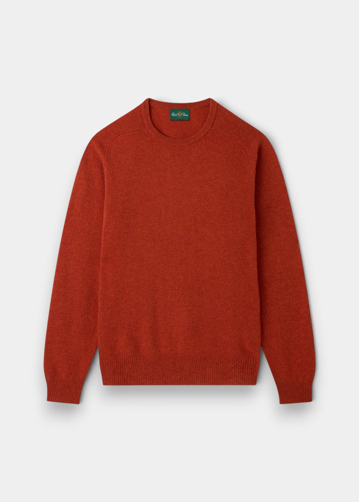 Lenzie Lambswool Crew Neck Jumper in Ember—regular fit, long sleeves, soft Yorkshire knitwear, laid flat.