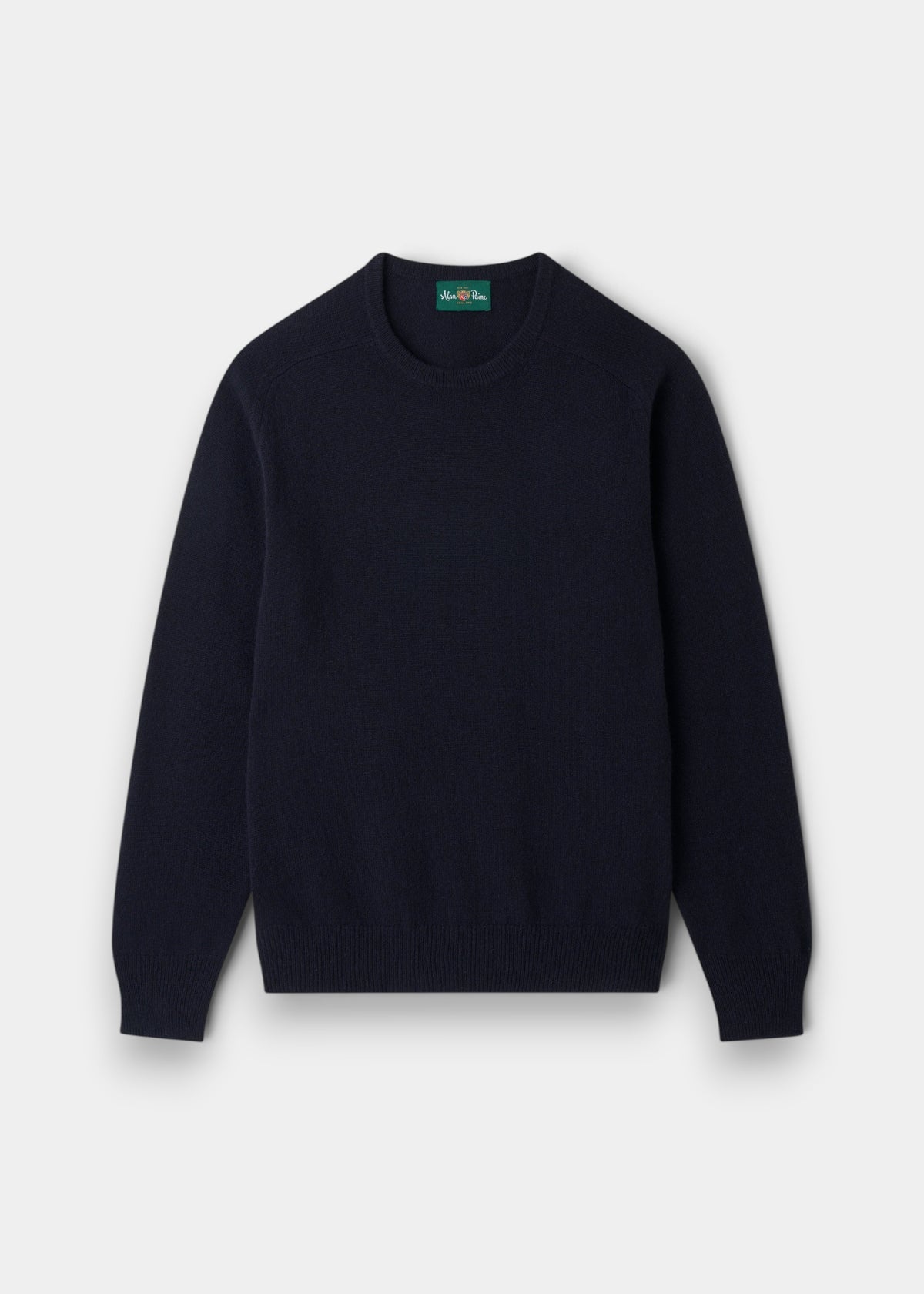 Lenzie Lambswool Crew Neck Jumper in navy, regular fit, long sleeves, laid flat on a light gray background.