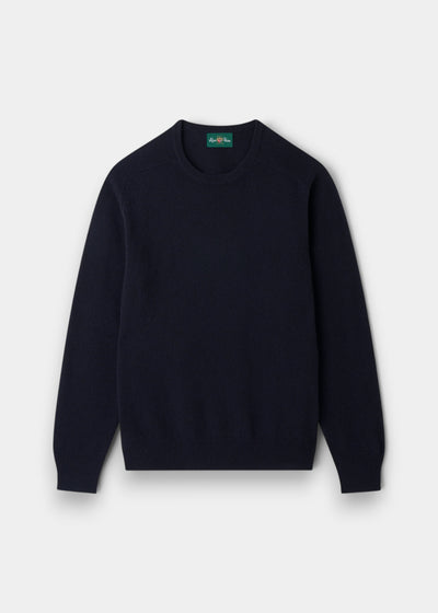 Lenzie Lambswool Crew Neck Jumper in navy, regular fit, long sleeves, laid flat on a light gray background.