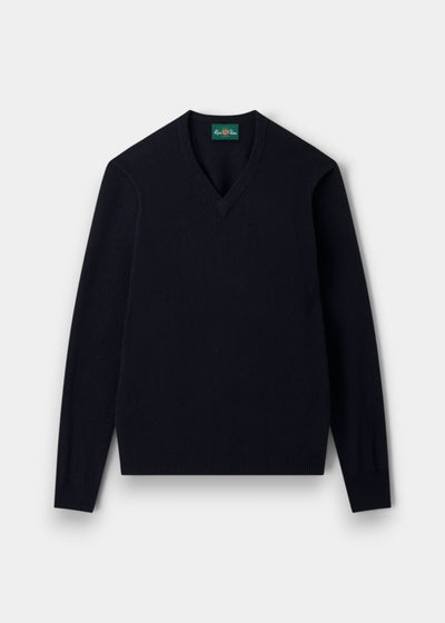 Navy Hampshire lambswool V-neck jumper, classic fit, with long sleeves, laid flat on a white background.