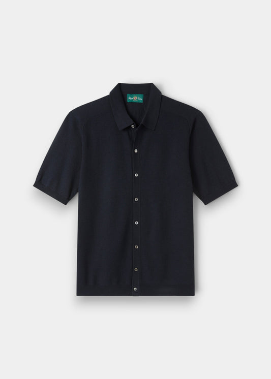 Alan Paine Wellswood dark navy short-sleeve shirt in a premium cotton-merino knit with a classic collar and buttons.