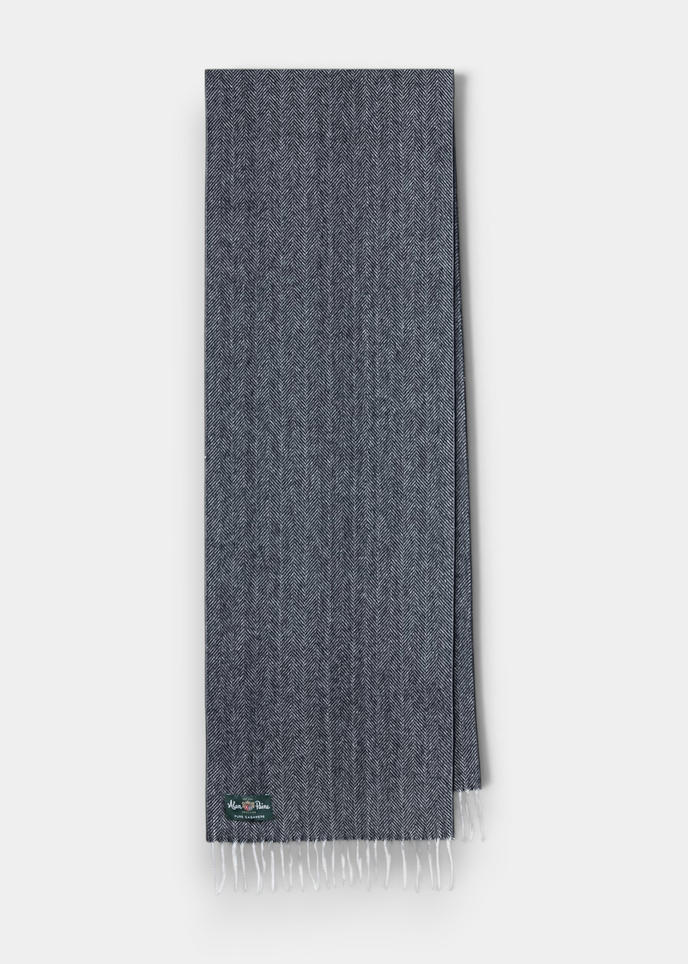 Kinross Cashmere Herringbone Scarf in Charcoal, featuring white fringed ends, shown laid flat on a white background.