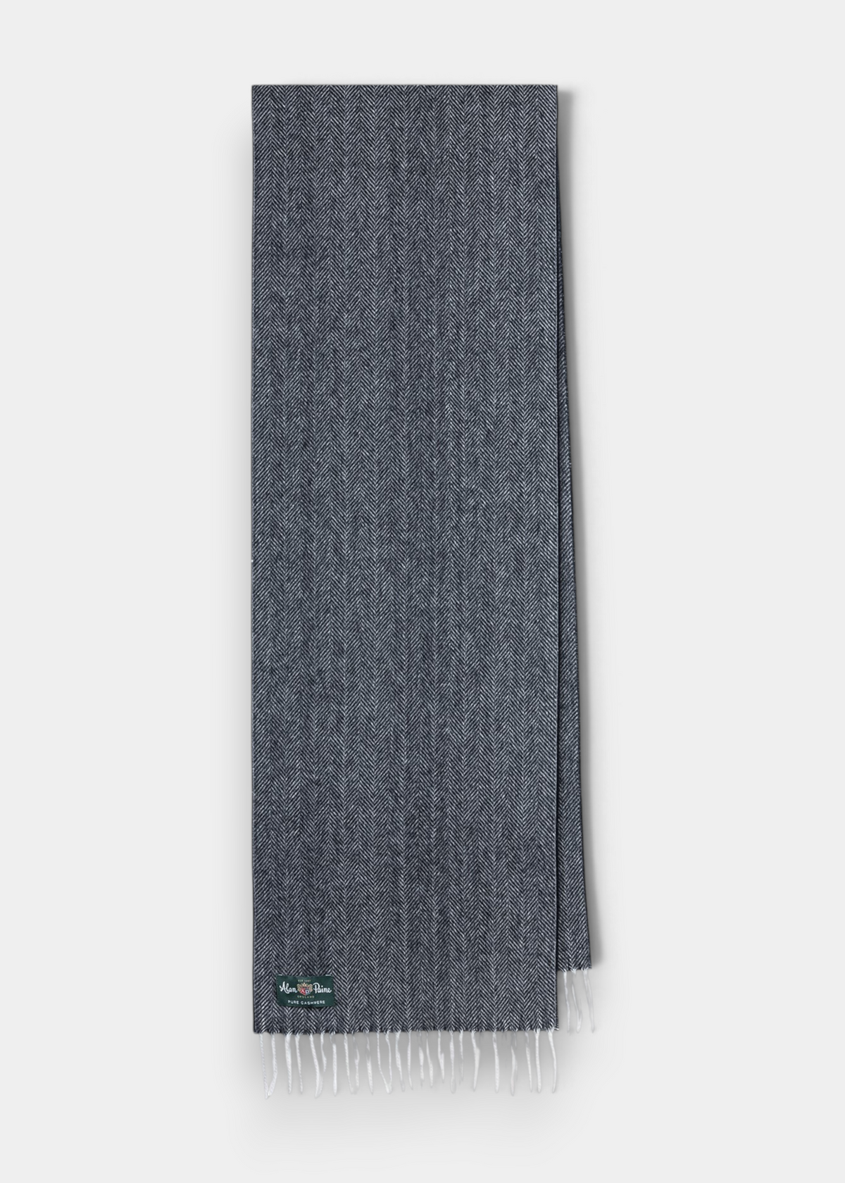 Kinross Cashmere Herringbone Scarf in Charcoal, featuring white fringed ends, shown laid flat on a white background.
