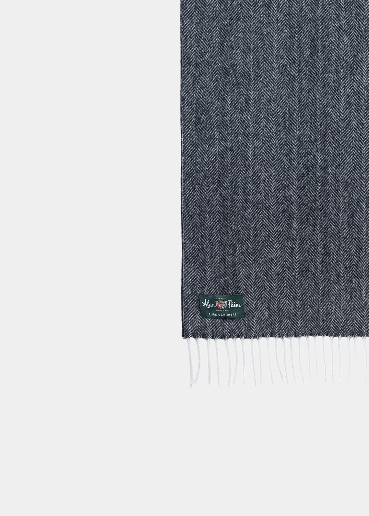 Kinross Cashmere Herringbone Scarf in charcoal, with fringed ends and a green label, shown on a white background.