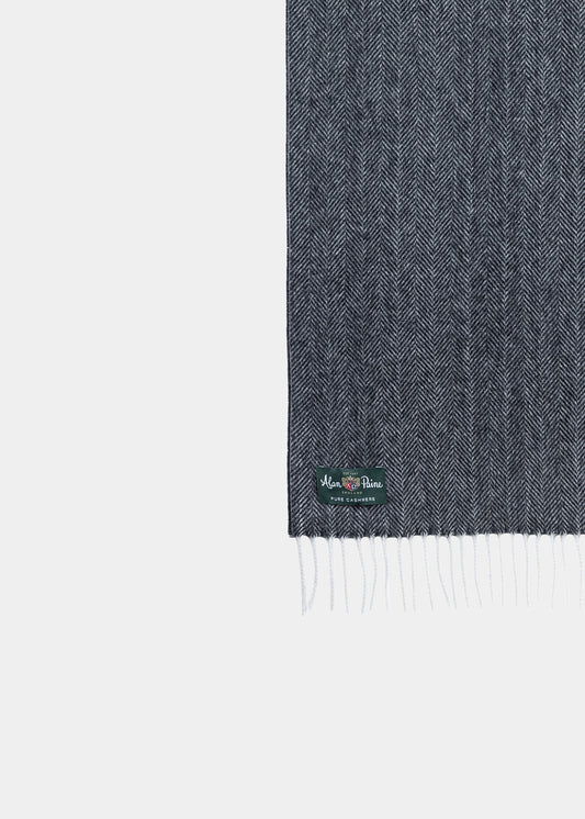 Kinross Cashmere Herringbone Scarf in charcoal, with fringed ends and a green label, shown on a white background.